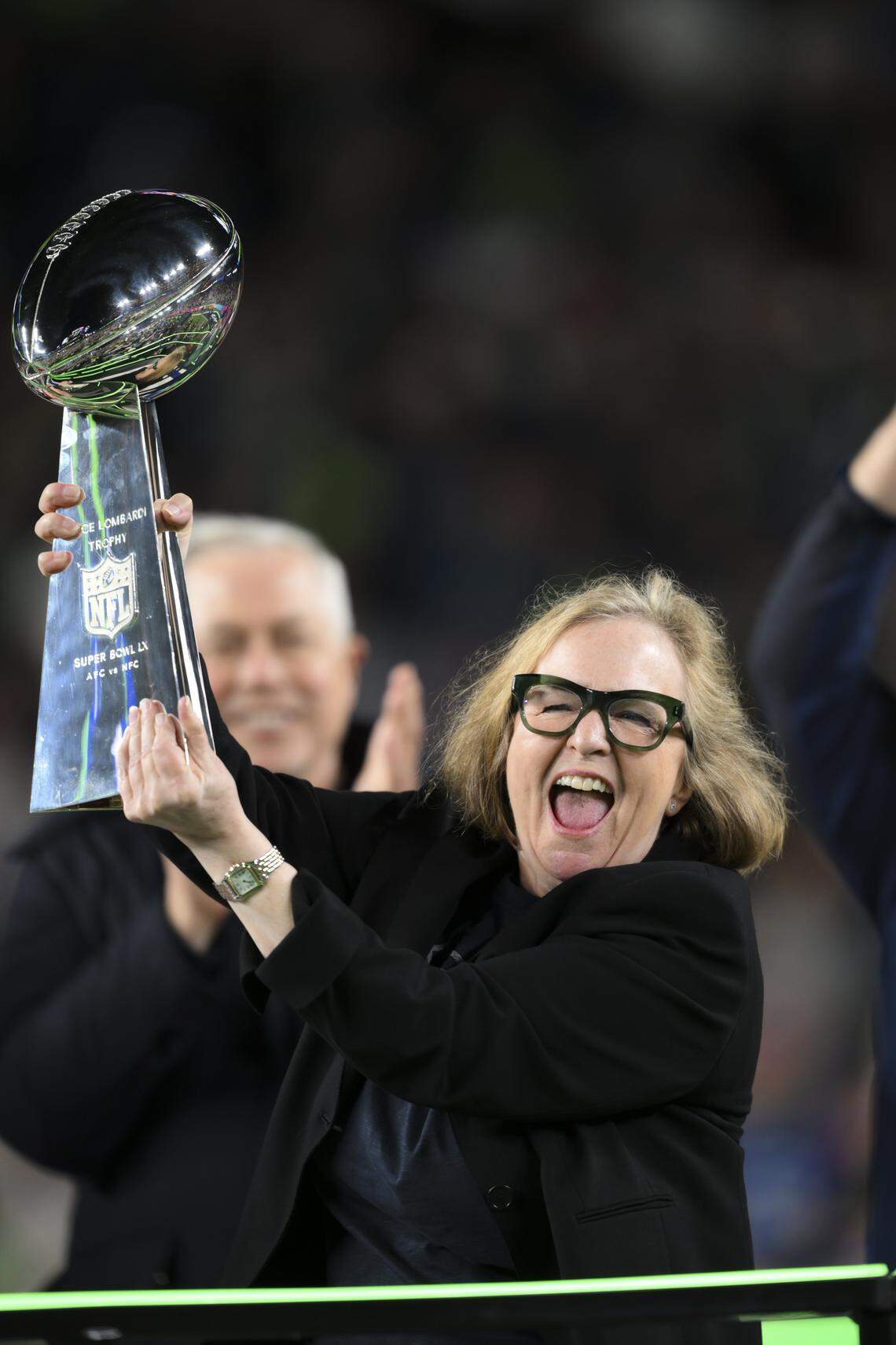 Seattle Seahawks team chair Jody Allen holds up the Lombardi Trophy after beating the New England Patriots 29-13 in Super Bowl LX at Levi's Stadium on Sunday, Feb. 8, 2026, in Santa Clara, Calif.