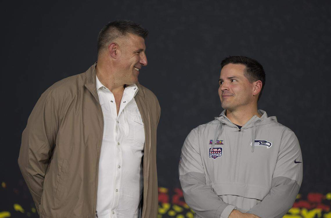 New England Patriots head coach Mike Vrabel and Seattle Seahawks head coach Mike Macdonald talk during the Super Bowl Opening Night Ceremony, at San Jose Convention Center on Monday, Feb. 2, 2026, in  San Jose, Calif.