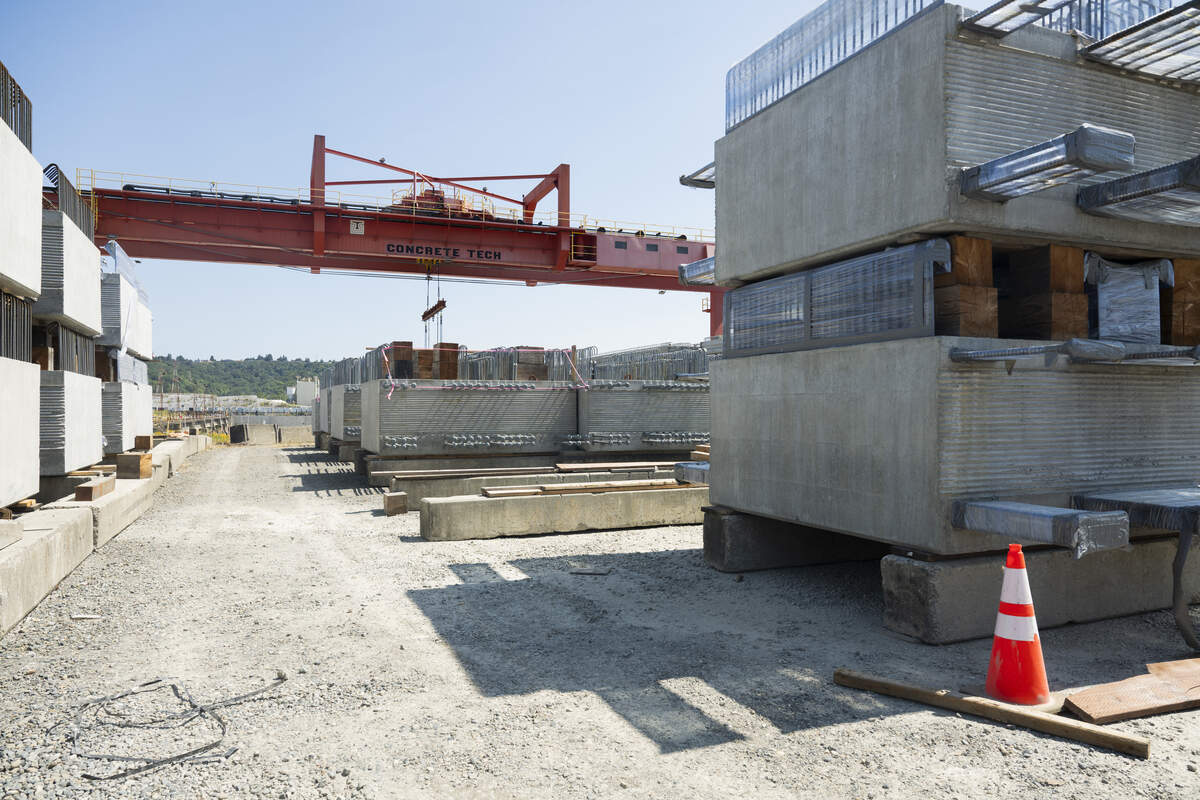 The gantry crane moves large concrete pieces at Concrete Technology Corporation, on Monday, July 13, 2026, in Tacoma, Wash.