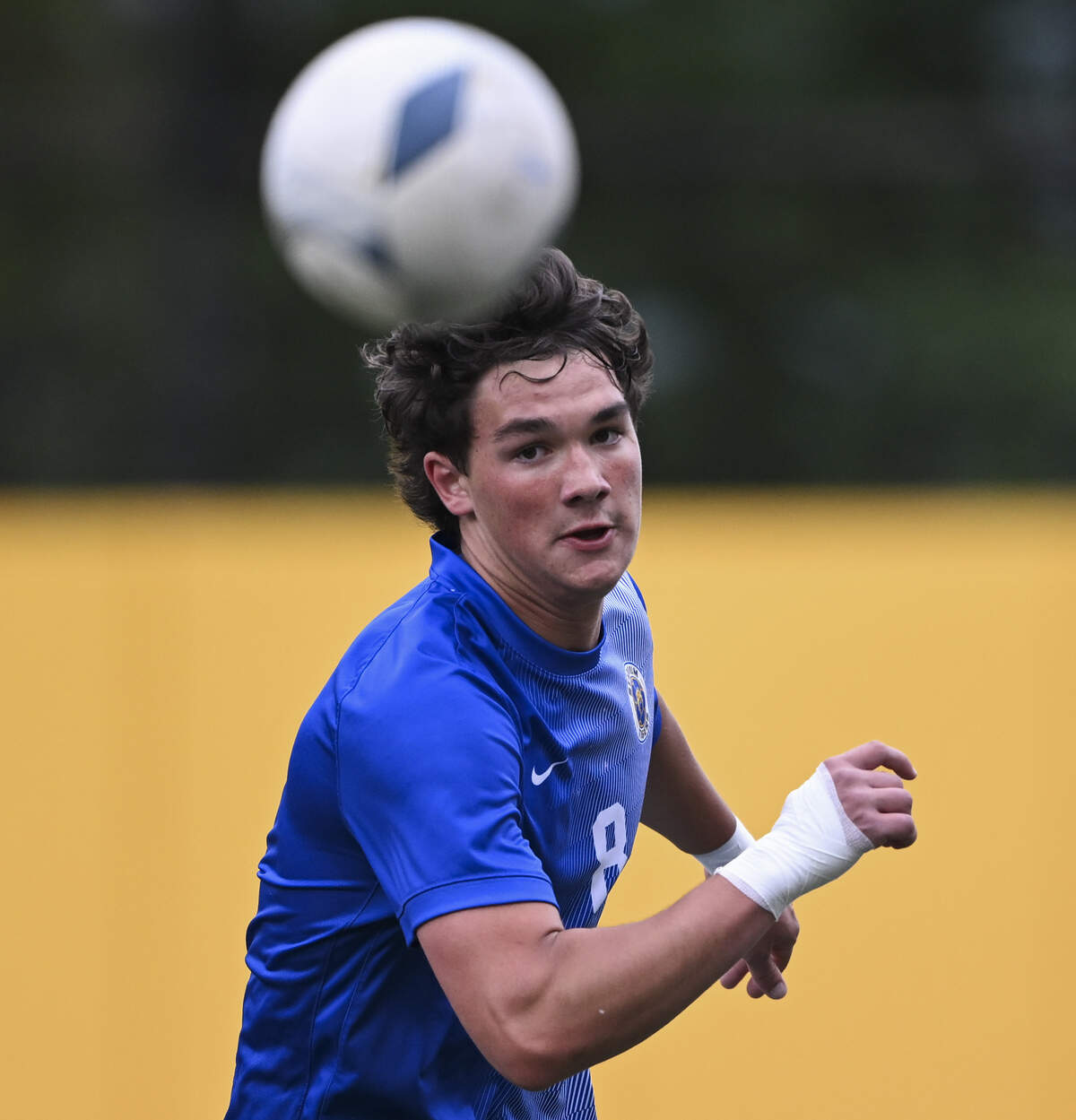 Stadium's Abraham Cooper (8) chases down the ball during the 4A state boys soccer tournament opening round match against Hanford at Stadium High School, on Tuesday, May 19, 2026, in Tacoma, Wash.