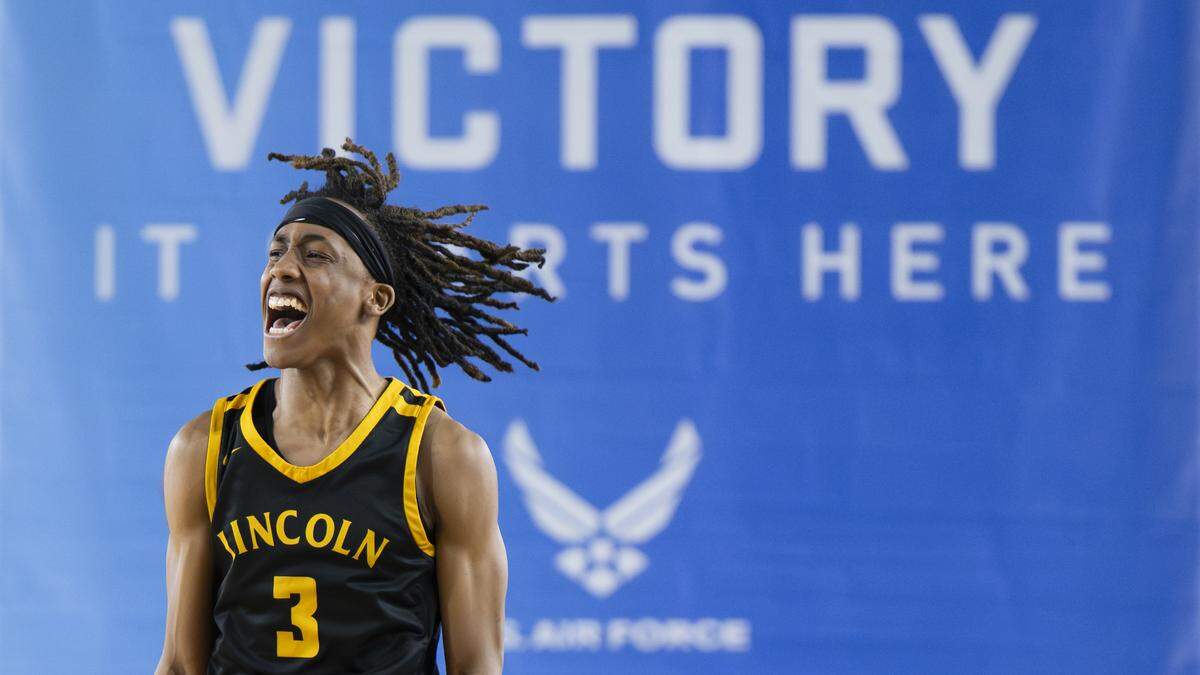 Lincoln guard Davion Shareef-Dulaney (3) reacts to beating Eastside Catholic during the semifinal round of the 3A State Tournament at the Tacoma Dome, on Friday, March 6, 2026, in Tacoma.