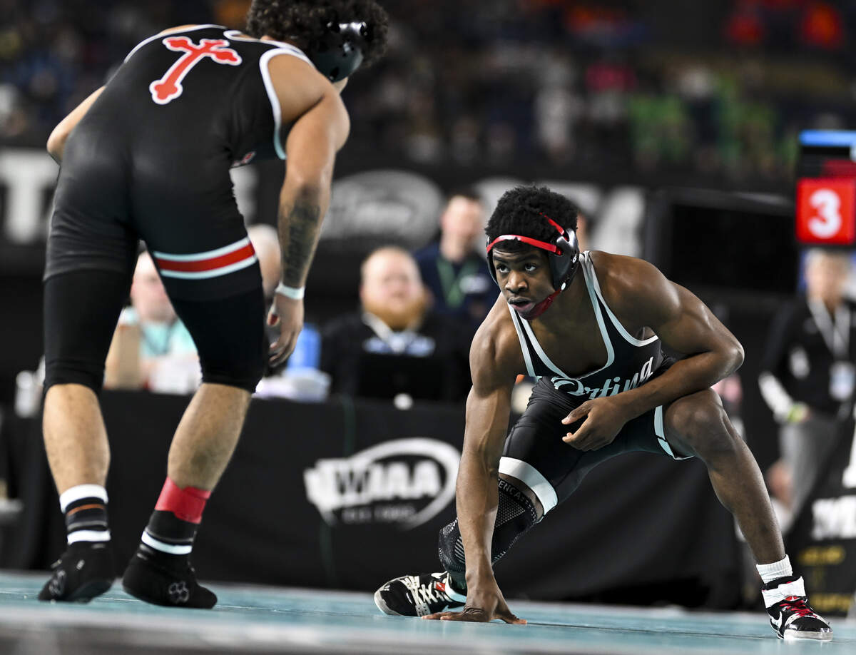 Orting’s Dominic Thomas and Toppenish’s Justyce Zuniga circle in the Boys 2A 138-pound Championship match during the Mat Classic XXXVII at the Tacoma Dome, on Saturday, Feb. 21, 2026, in Tacoma, Wash.