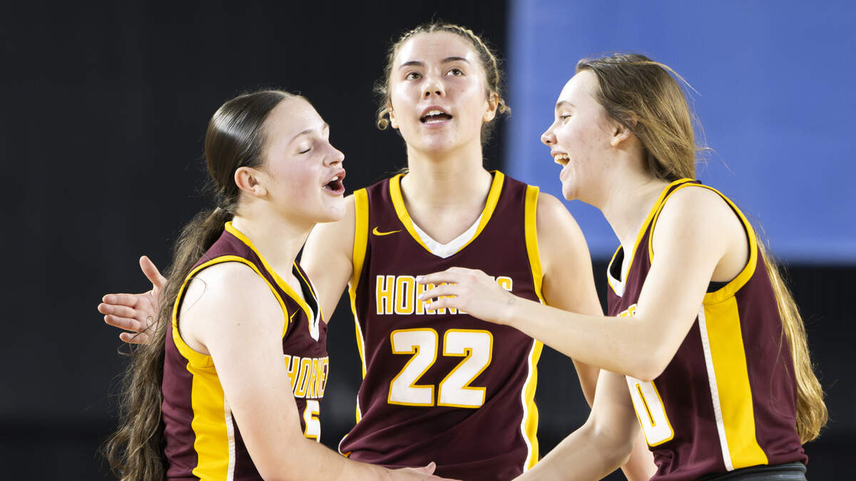 White River Lilly Banks (5), Maggee Schmitz (22) and Kaitlyn Hewlett (10) react to a travel against North Thurston during the first round of the 3A State Tournament at the Tacoma Dome, on Wednesday, March 4, 2026, in Tacoma, Wash.