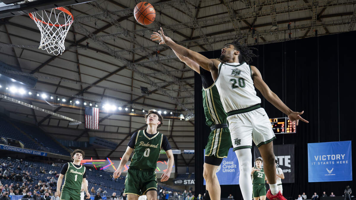Emerald Ridge forward Jamaize McGriff (20) goes to the net against Redmond during the first round of the 4A State Tournament at the Tacoma Dome, on Wednesday, March 4, 2026, in Tacoma, Wash.