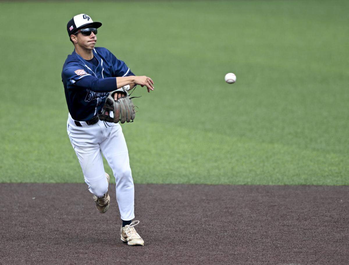 Gonzaga Prep's Jacob Wilson (12) throws to first base to retire Richland's Braylon Edwards (4) during the 4A State Semifinal game at Funko Field, on Friday, May 29, 2026, in Everett, Wash.