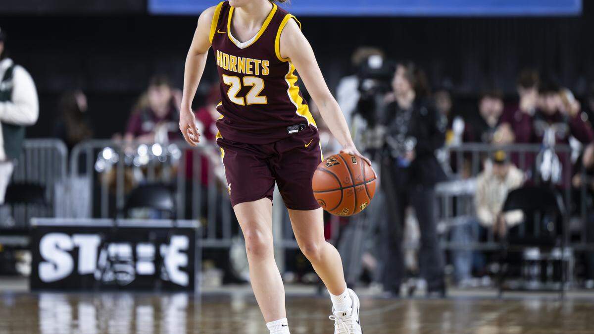White River guard Maggee Schmitz (22) brings the ball up court against North Thurston during the first round of the 3A State Tournament at the Tacoma Dome, on Wednesday, March 4, 2026, in Tacoma, Wash.
