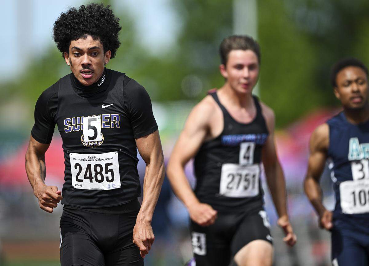 Sumner’s Izear Ferguson competes in the 4A 100-meter dash during day one of the Track and Field Championship at Mount Tahoma High School, on Thursday, May 28, 2026, in Tacoma, Wash.