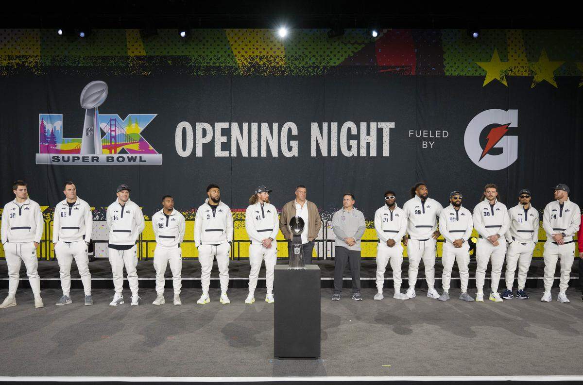 The team captains and head coaches of New England Patriots and Seattle Seahawks face off during the Super Bowl Opening Night Ceremony, at San Jose Convention Center on Monday in San Jose.