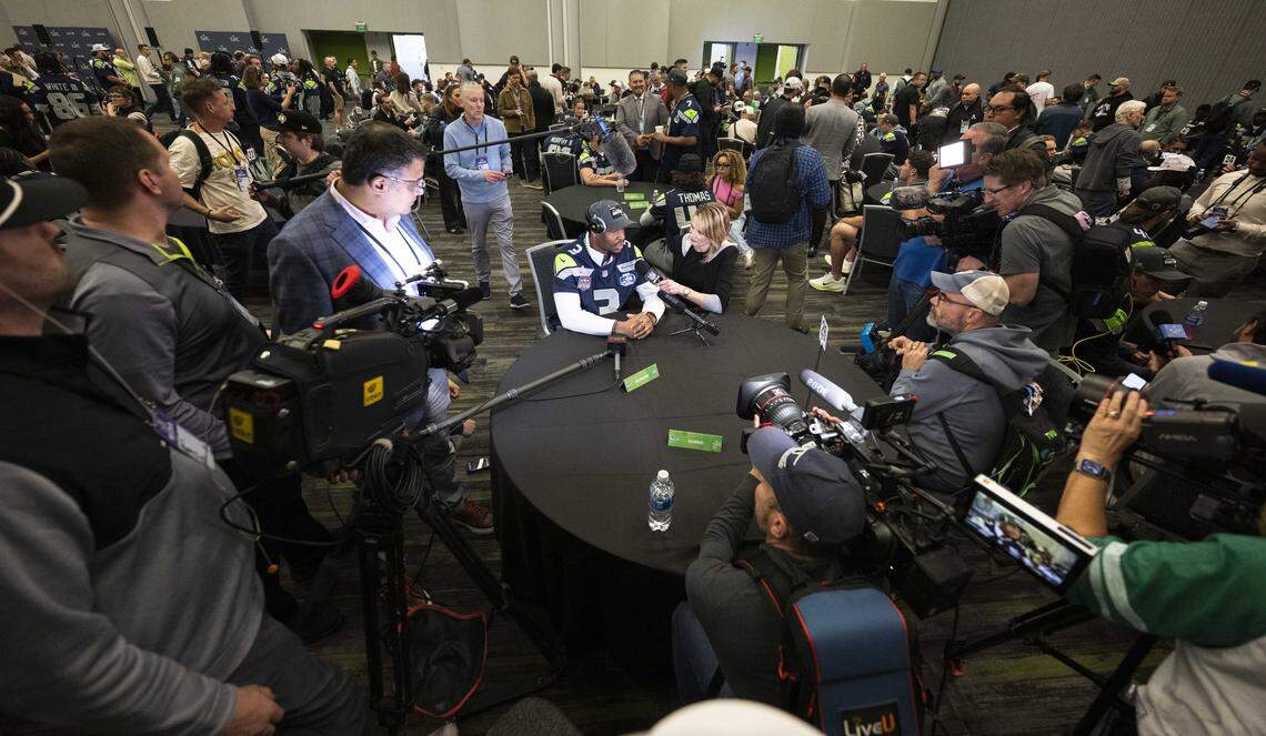 Seattle Seahawks safety Nick Emmanwori (3) is surrounded by the media during Seahawks team availability , at San Jose Convention Center on Wednesday, Feb. 4, 2026, in San Jose, Calif.