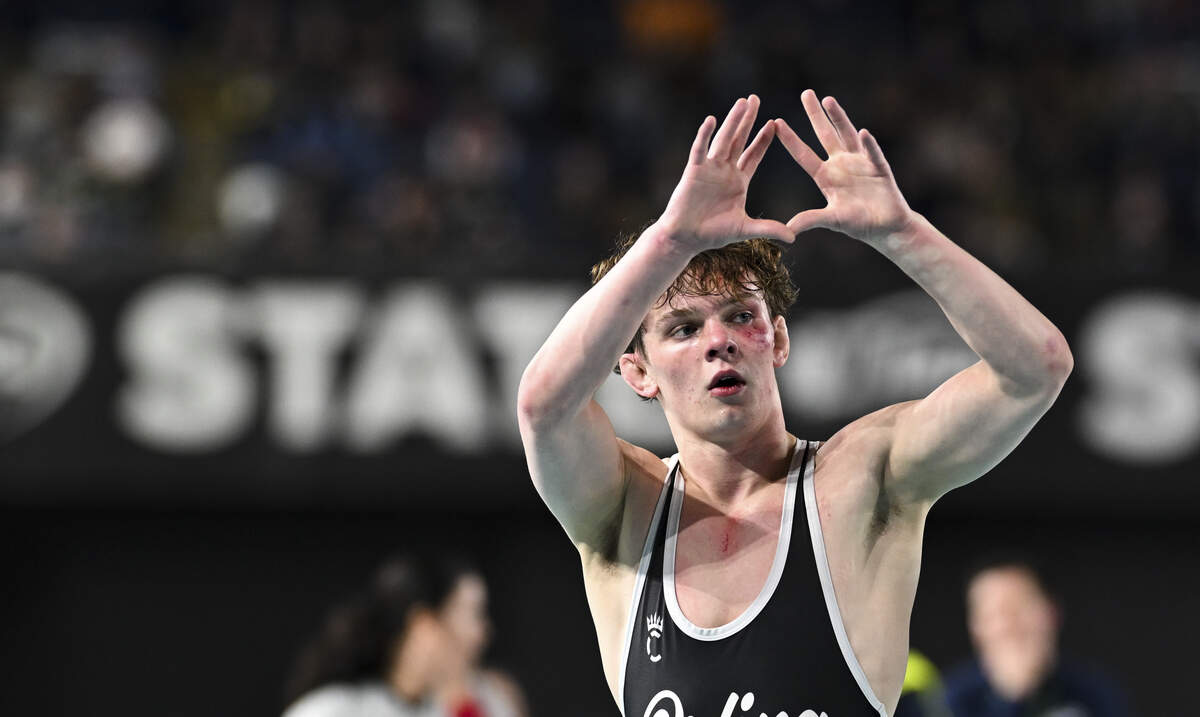 Orting’s Trevor Anderson reacts to beating Toppenish’s Steve Romero in the Boys 2A 126-pound Championship match during the Mat Classic XXXVII at the Tacoma Dome, on Saturday, Feb. 21, 2026, in Tacoma, Wash.