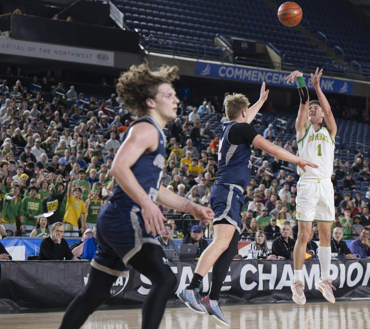 Richland guard Landen Northrop (1) shoots a jumper against Gonzaga Prep during the Boys 4A State Tournament Championship at the Tacoma Dome, on Saturday, March 7, 2026, in Tacoma.