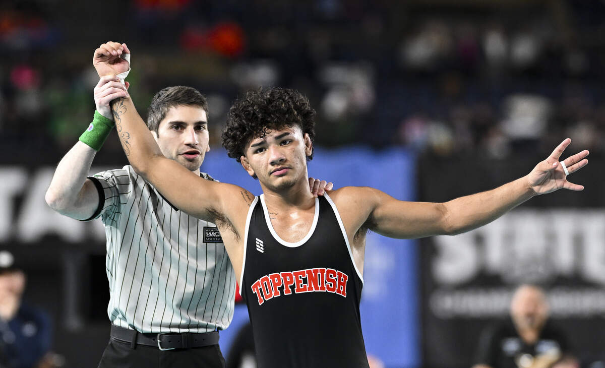 Toppenish’s Justyce Zuniga reacts to beating Orting’s Dominic Thomas in the Boys 2A 138-pound Championship match during the Mat Classic XXXVII at the Tacoma Dome, on Saturday, Feb. 21, 2026, in Tacoma, Wash.