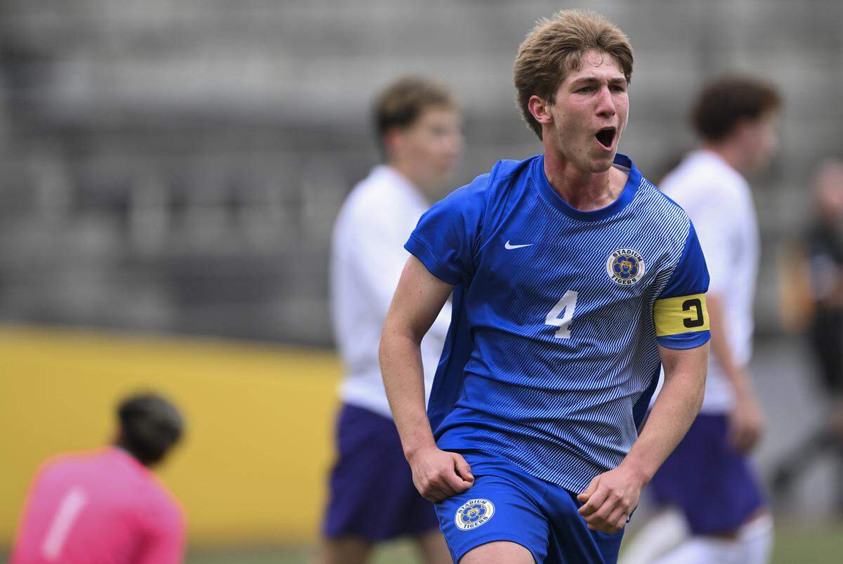 Stadium's Jack Luxenberg (4) reacts to scoring a goal against Hanford during the 4A state boys soccer tournament opening round match at Stadium High School, on Tuesday, May 19, 2026, in Tacoma.