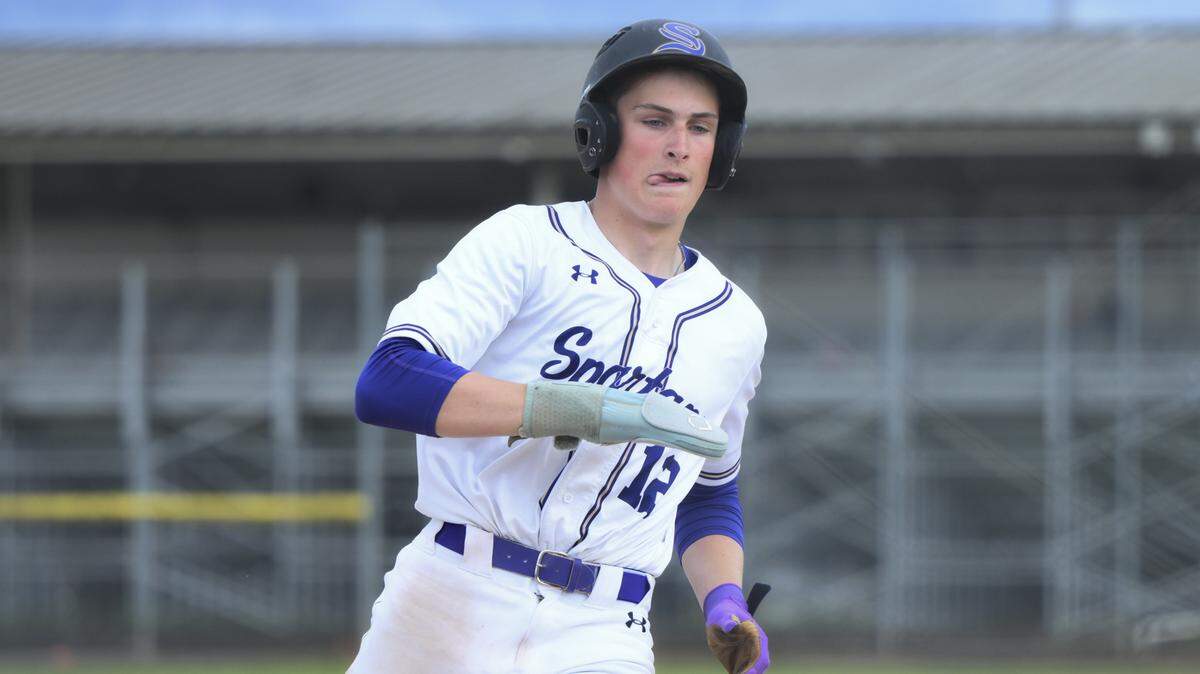 Sumner’s Jake Miller (12) runs to third base during the game against Emerald Ridge at Sumner High School, on Tuesday, April 21, 2026, in Sumner.